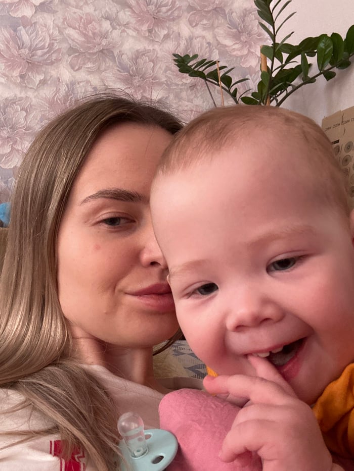 Mother documents winter morning moments with baby in rural Russia