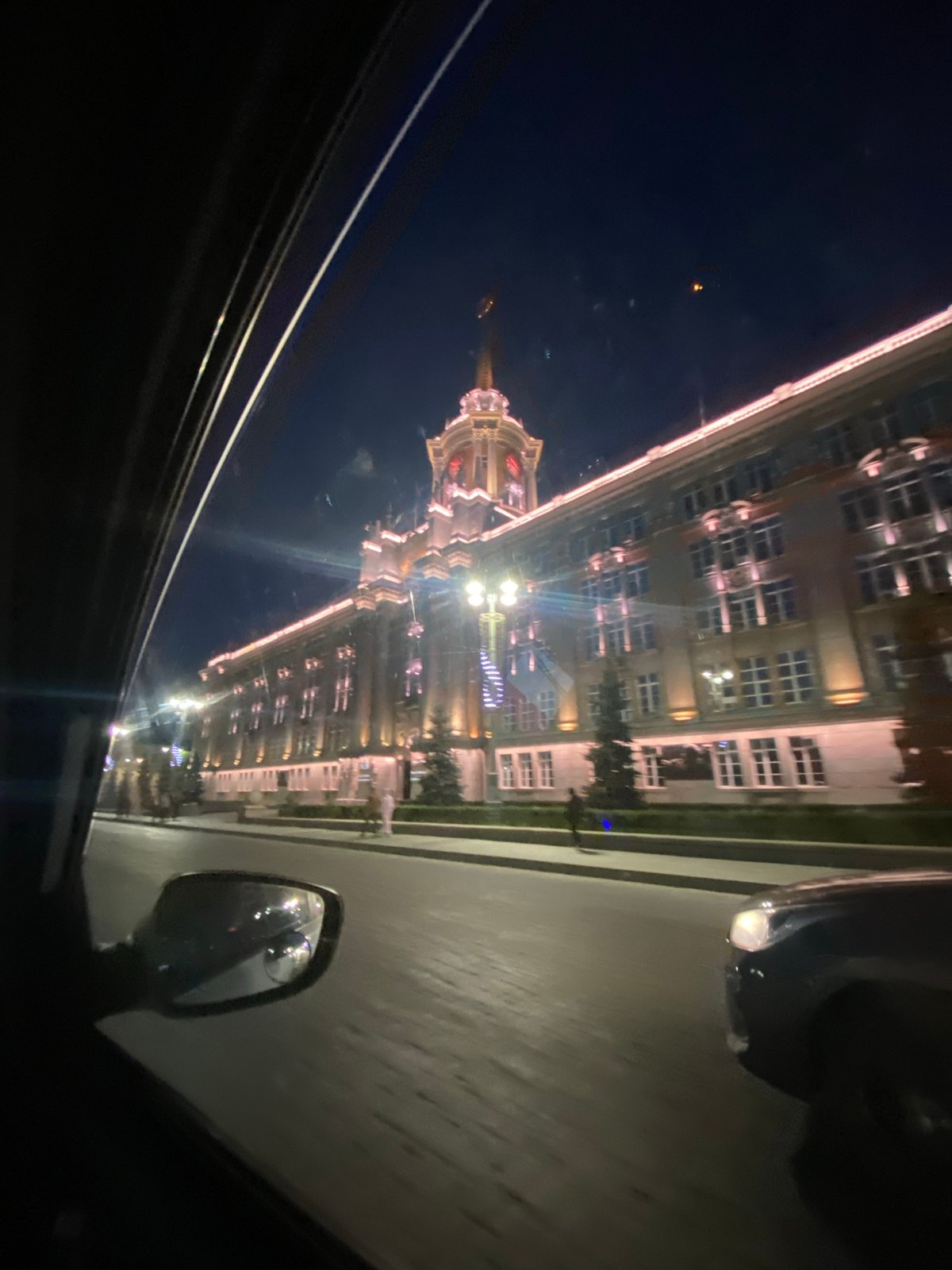Illuminated civic building observed at night in Yekaterinburg