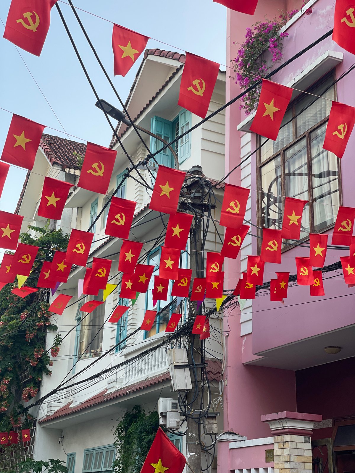 Vietnamese flags line streets in Đà Nẵng city scenes