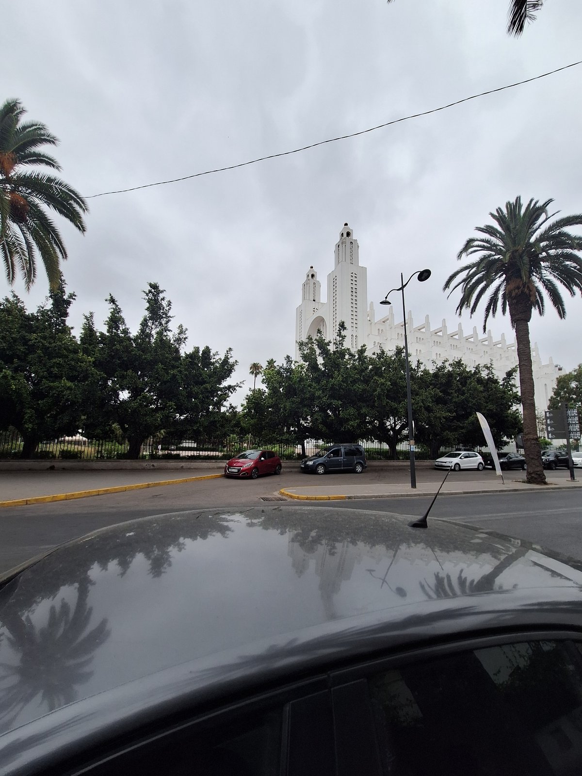 Inside and outside a modern Casablanca building, midday