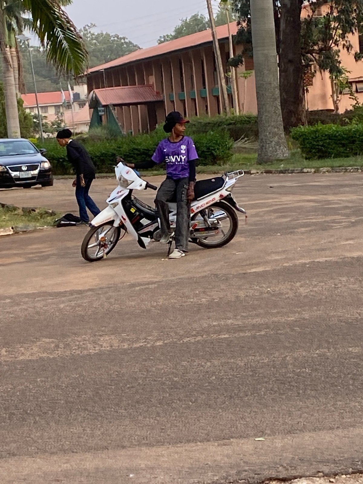 Motorcycle incident draws small crowd on Vom road
