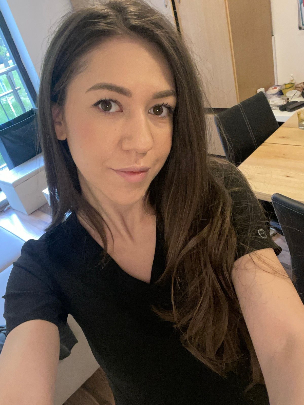 Woman takes early morning selfie in Sofia interior