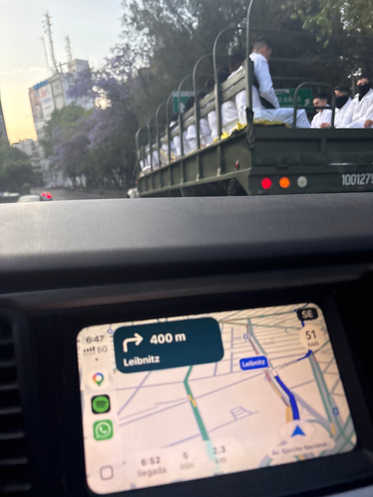 Driver follows military truck through Mexico City streets