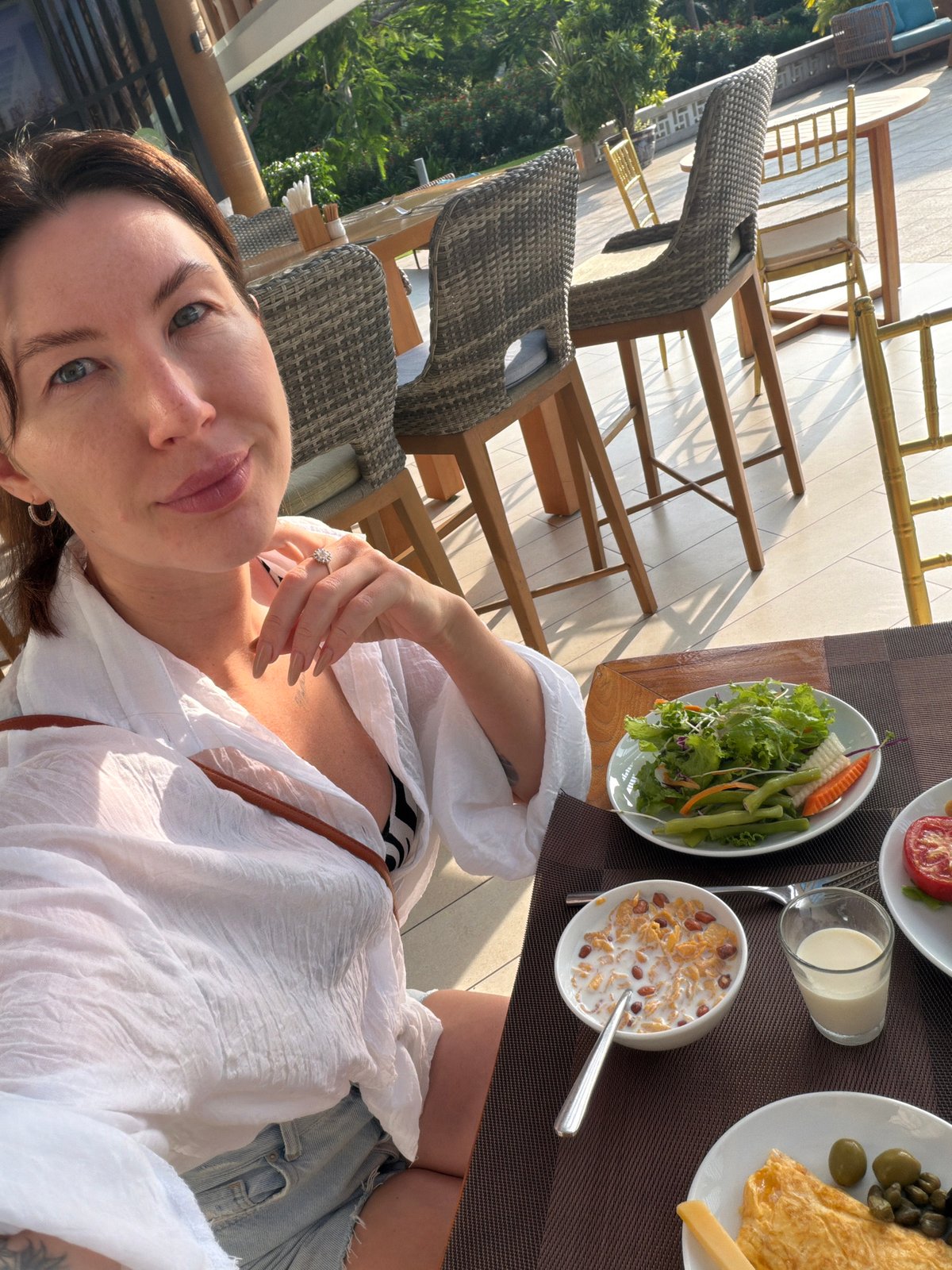 Tourist documents dining and selfies in Vietnamese coastal resort