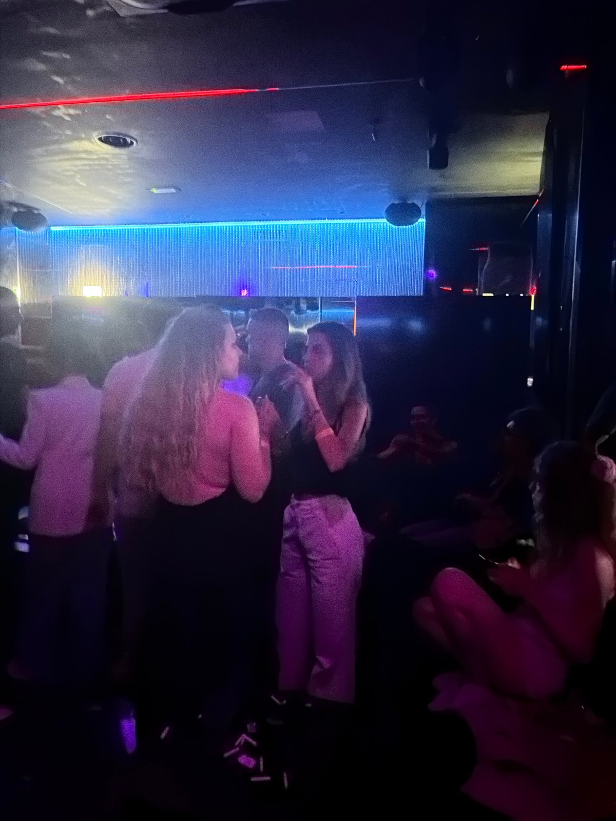 Late night social gathering at Milan entertainment venue