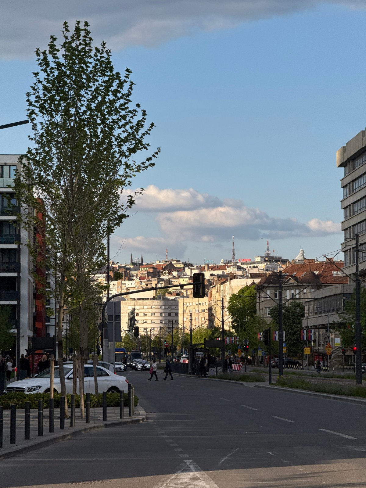 Belgrade street scenes captured under cloudy afternoon skies