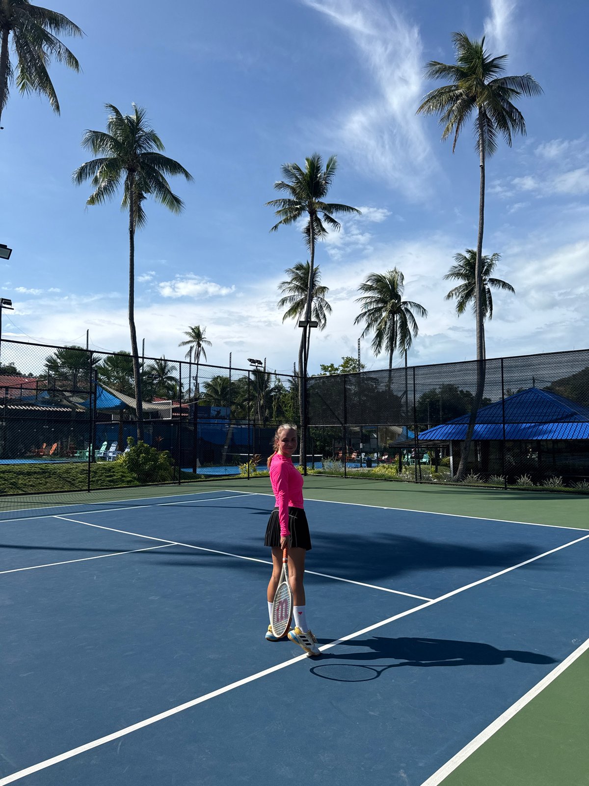Early morning tennis session in Baan Plai Laem, Thailand