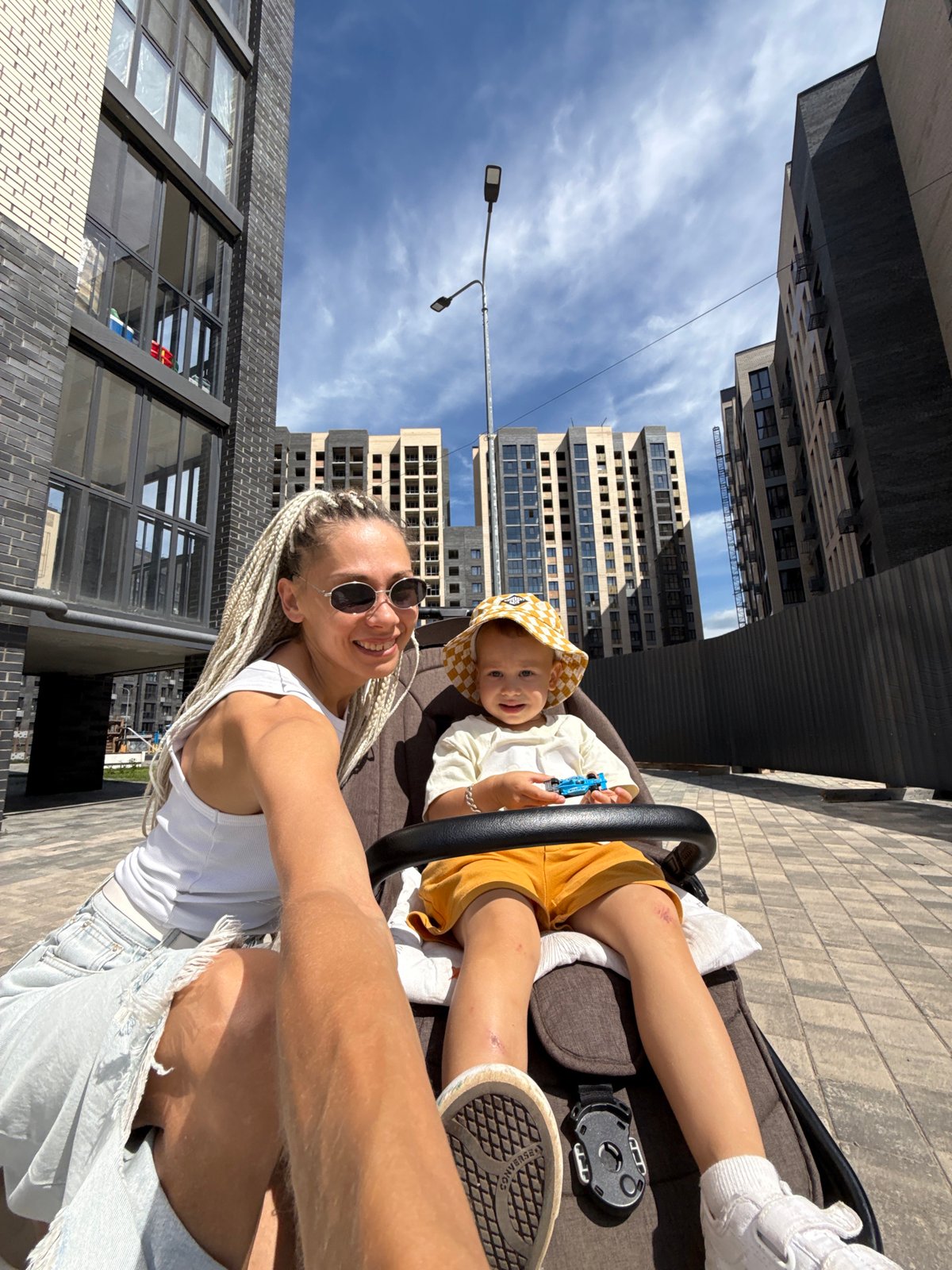 Casual courtyard selfies in a Rusanovo residential development