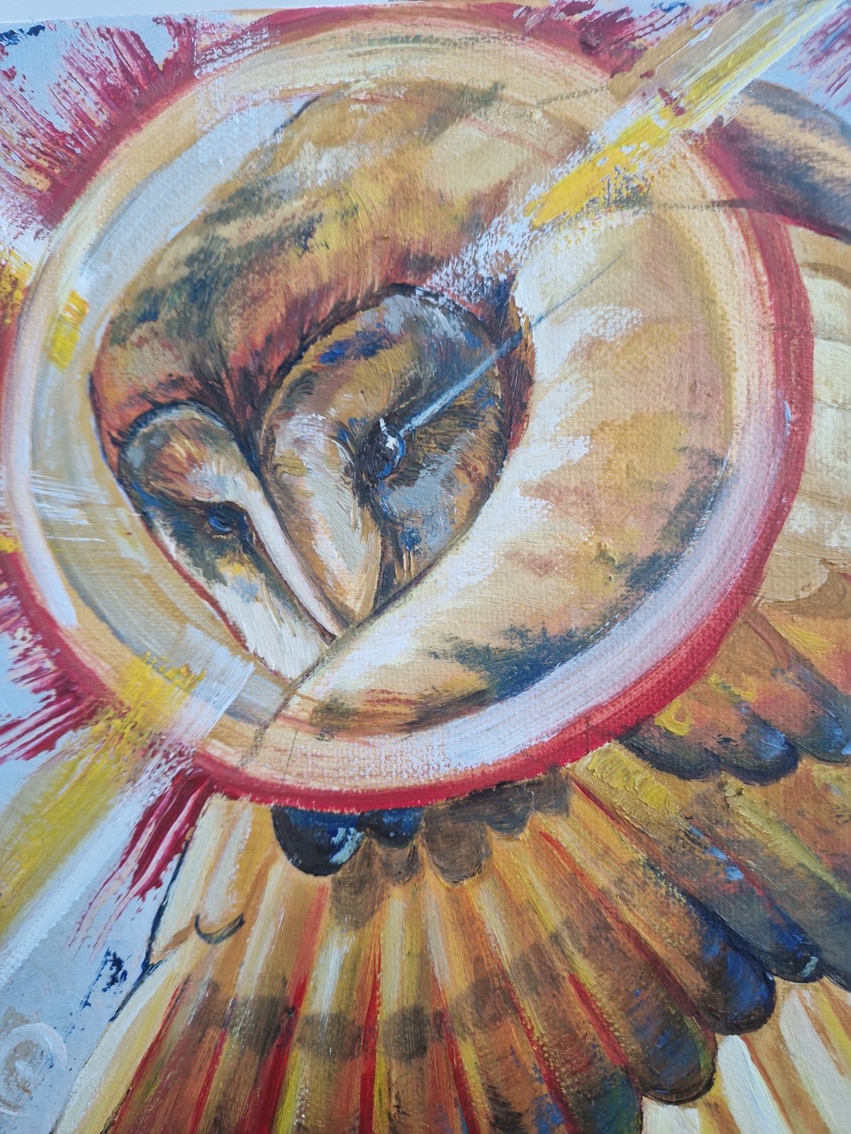 Artist creates abstract painting with warm colors, textured brushstrokes