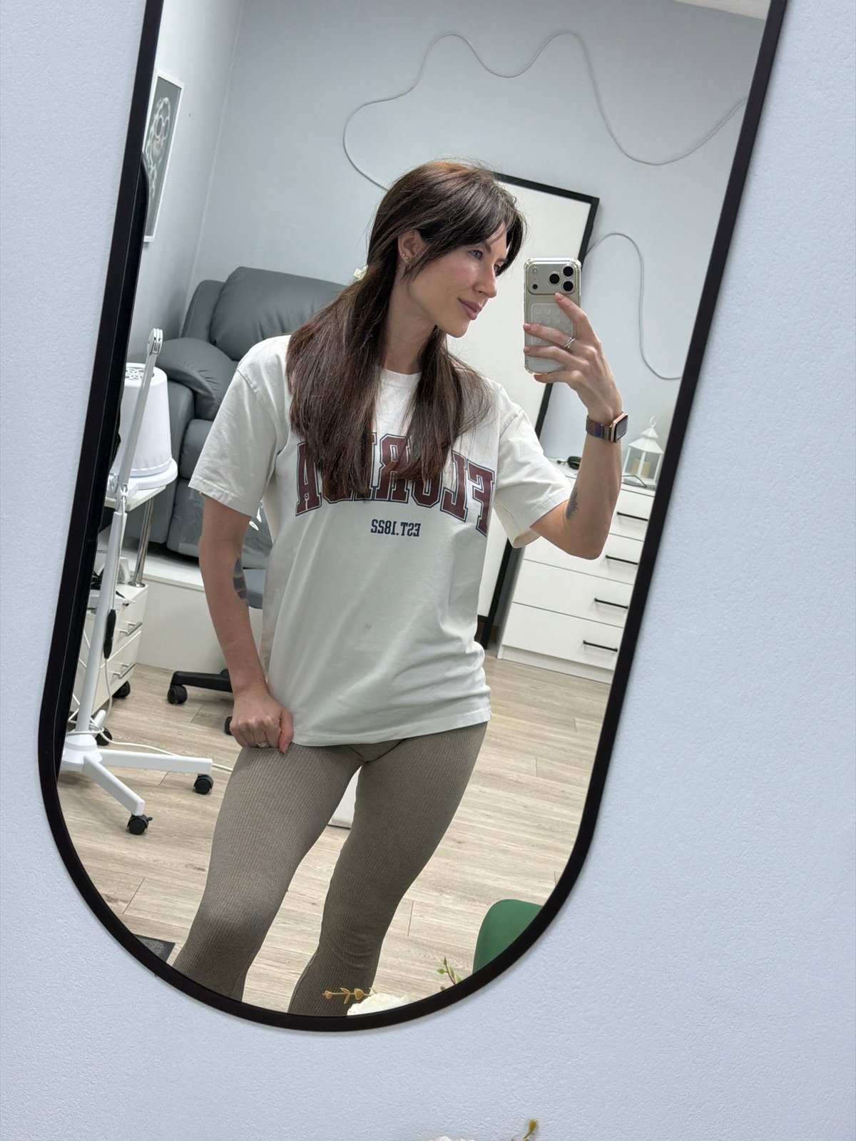 Woman takes mirror selfie in Perm, Russia