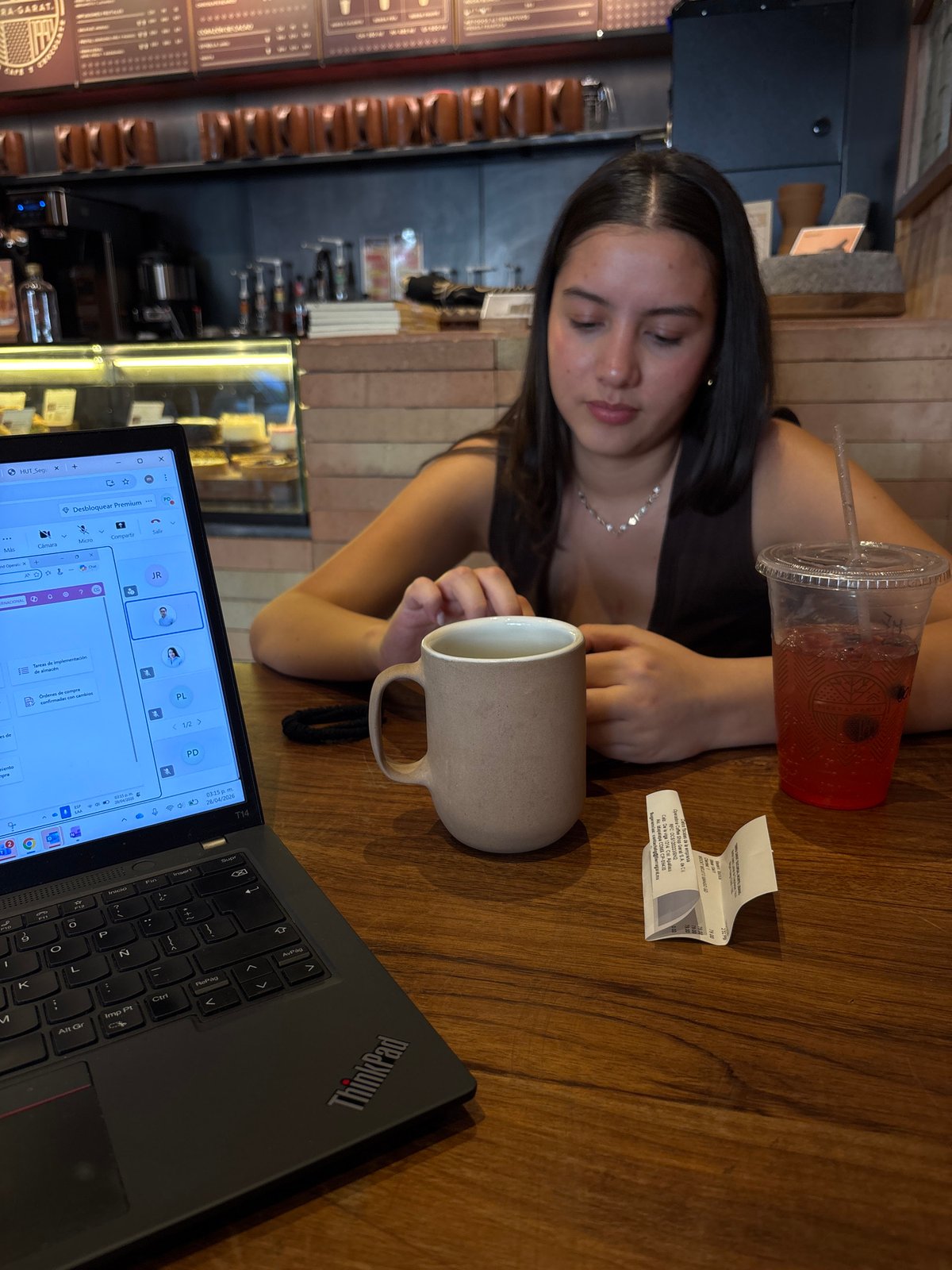 Tired woman rests at Mexico City cafe table