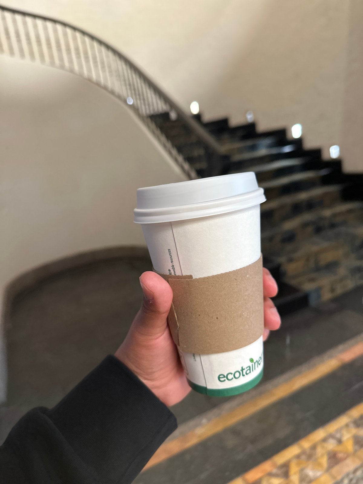 Coffee break captured in Mexican courtyard setting