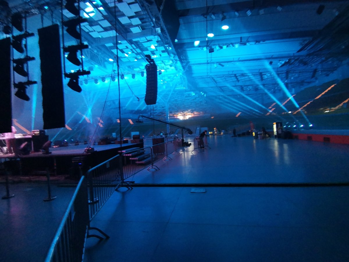 Blue-lit event setup captured at Plovdiv's Kolodruma Sports Hall