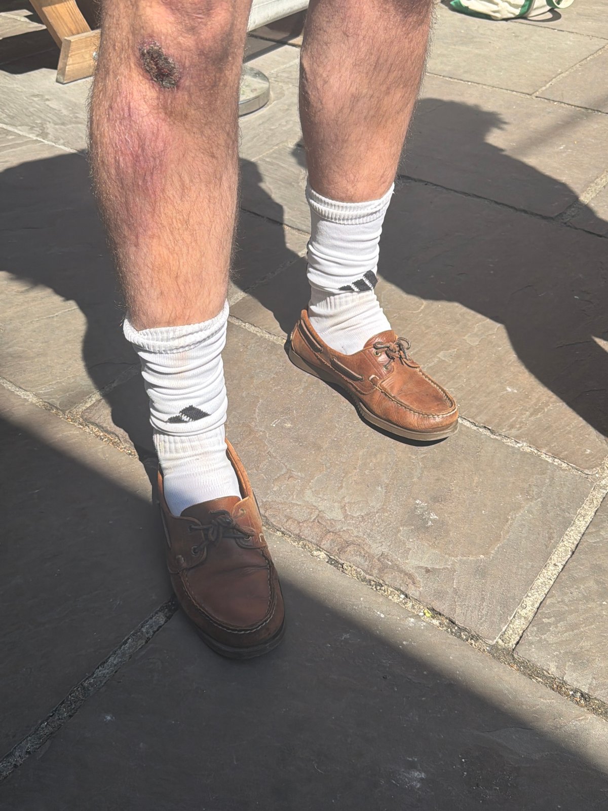 Men gather for casual afternoon at London pub garden