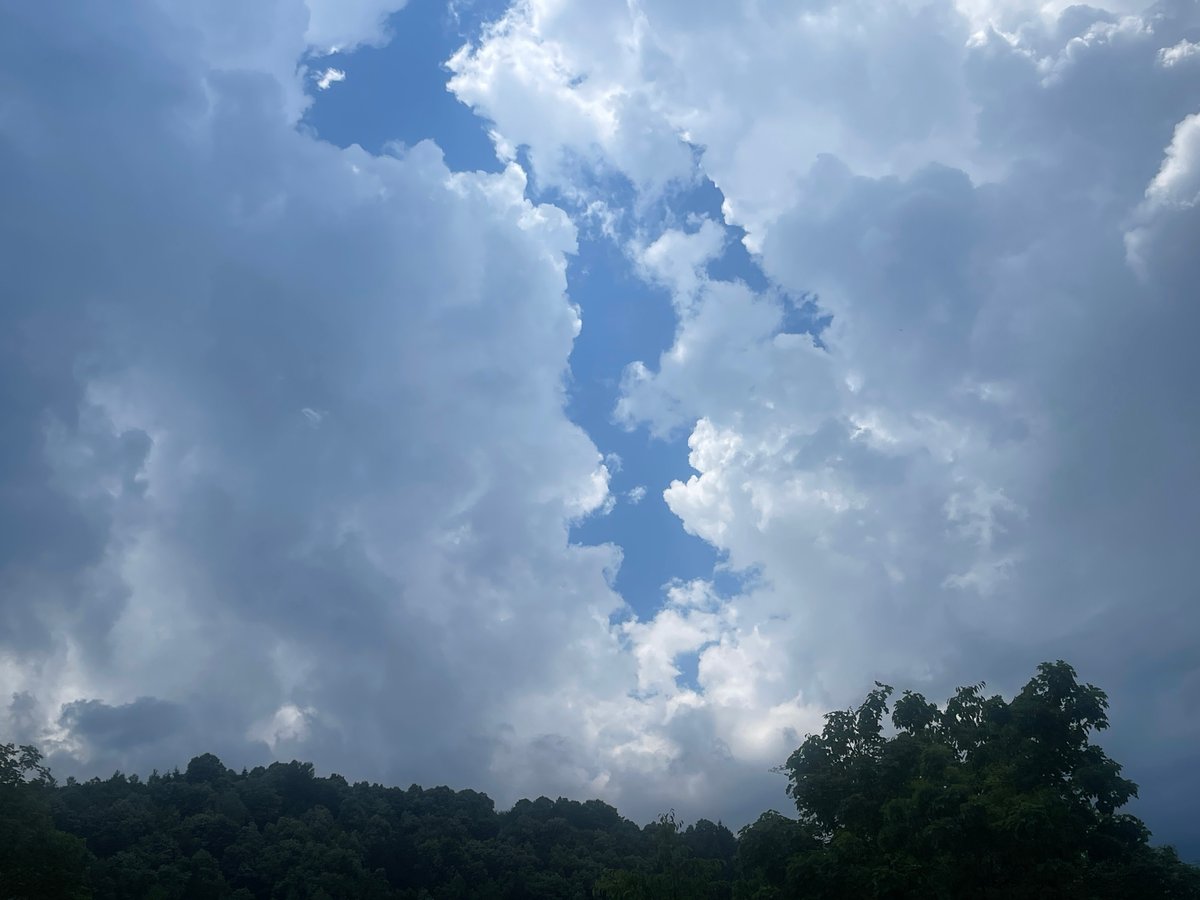 Dramatic storm clouds and sunlight captured over Berkovitsa, Bulgaria