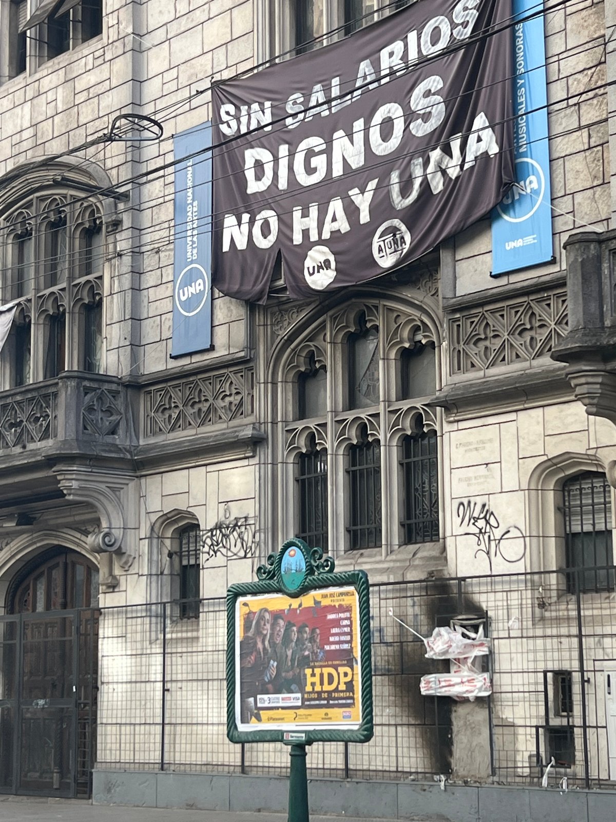 Buenos Aires Gothic architecture documented amid labor protest signage