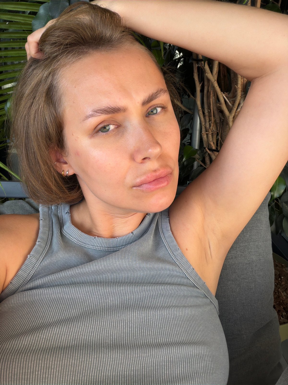 Casual high-angle selfie in Tel Aviv on a summer afternoon.