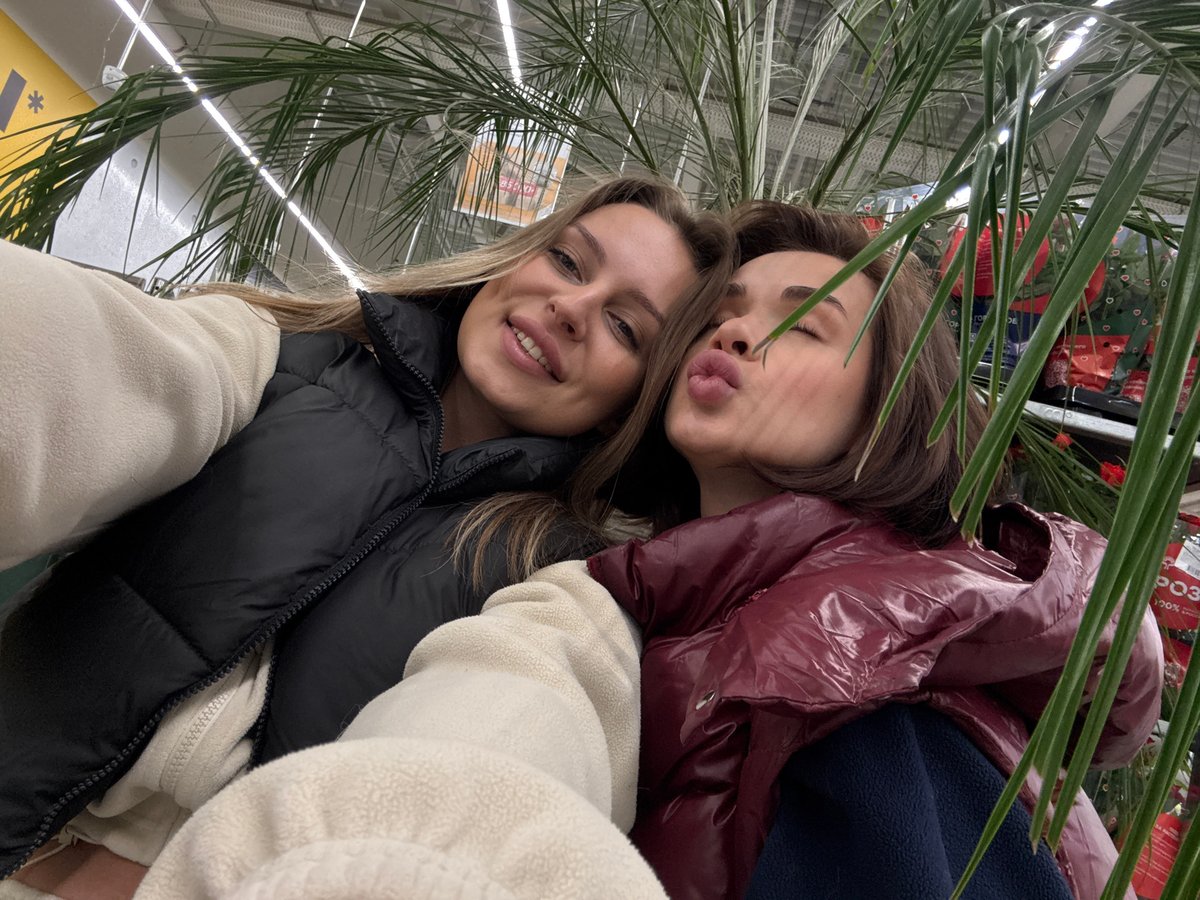 Two women shop and take selfies at Perm retail complex