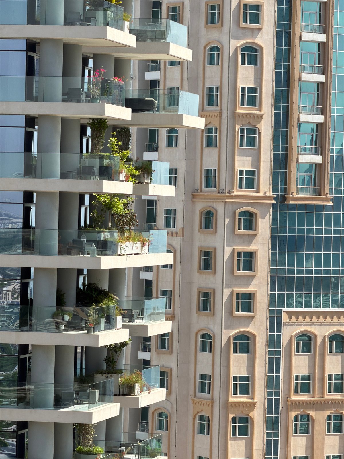 Balcony morning overlooking a busy modern waterfront city