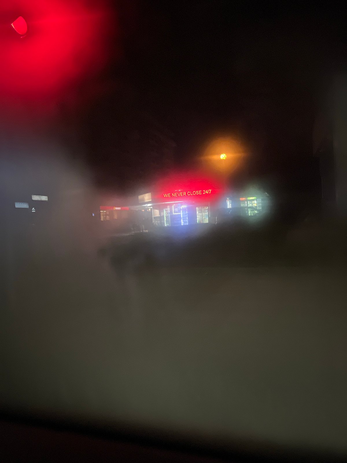 24/7 business signage photographed during night in Plovdiv