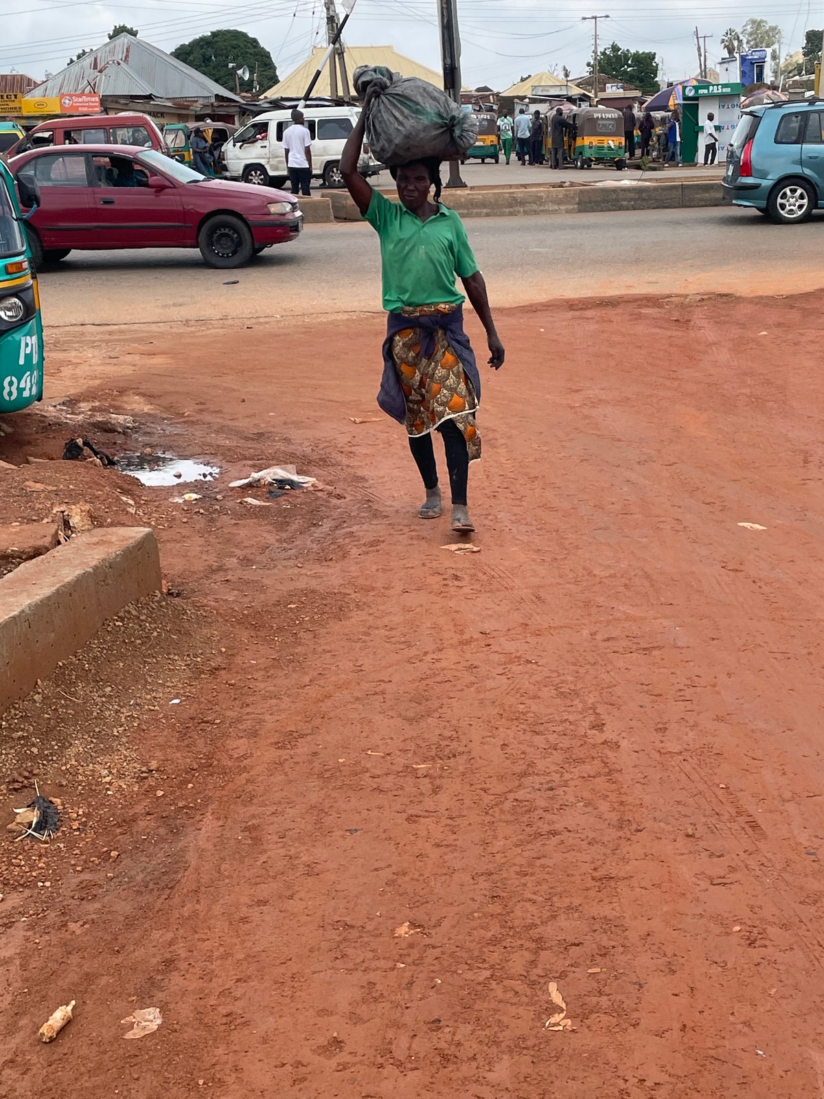 Morning street scenes across two Nigerian neighborhoods
