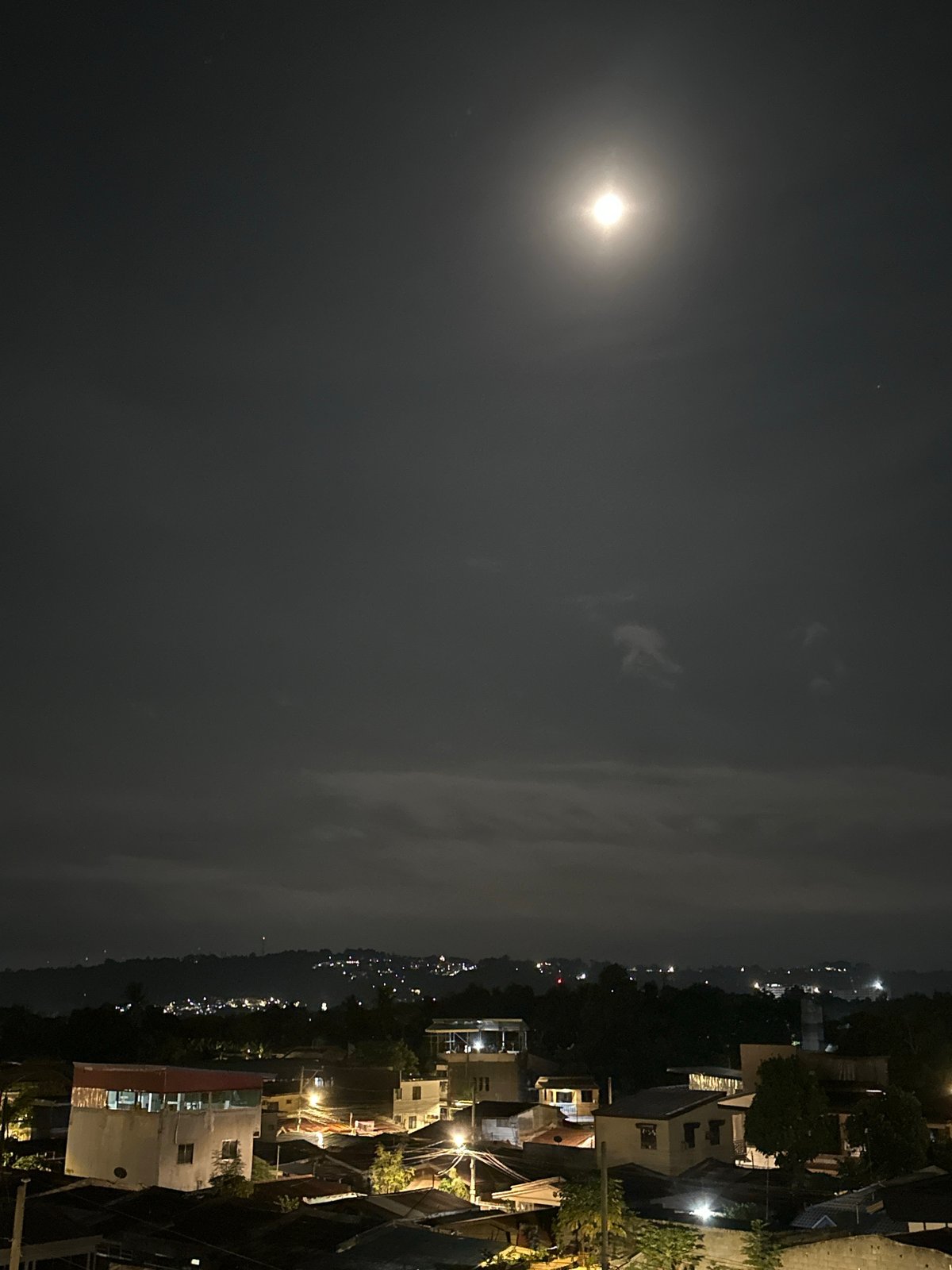 Full moon illuminates Davao City skyline in evening photographs