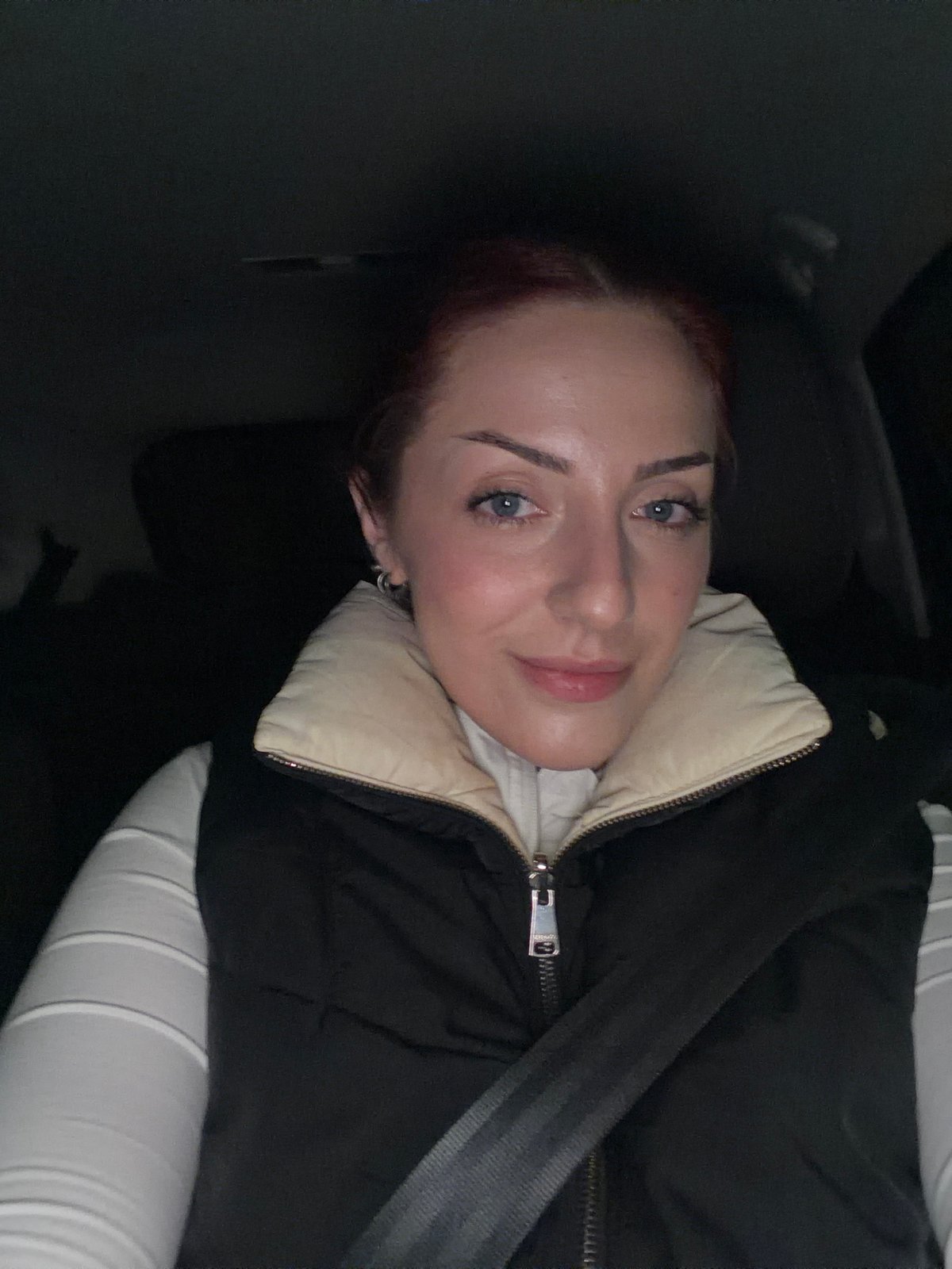 Woman in black vest observed in vehicle in Sofia