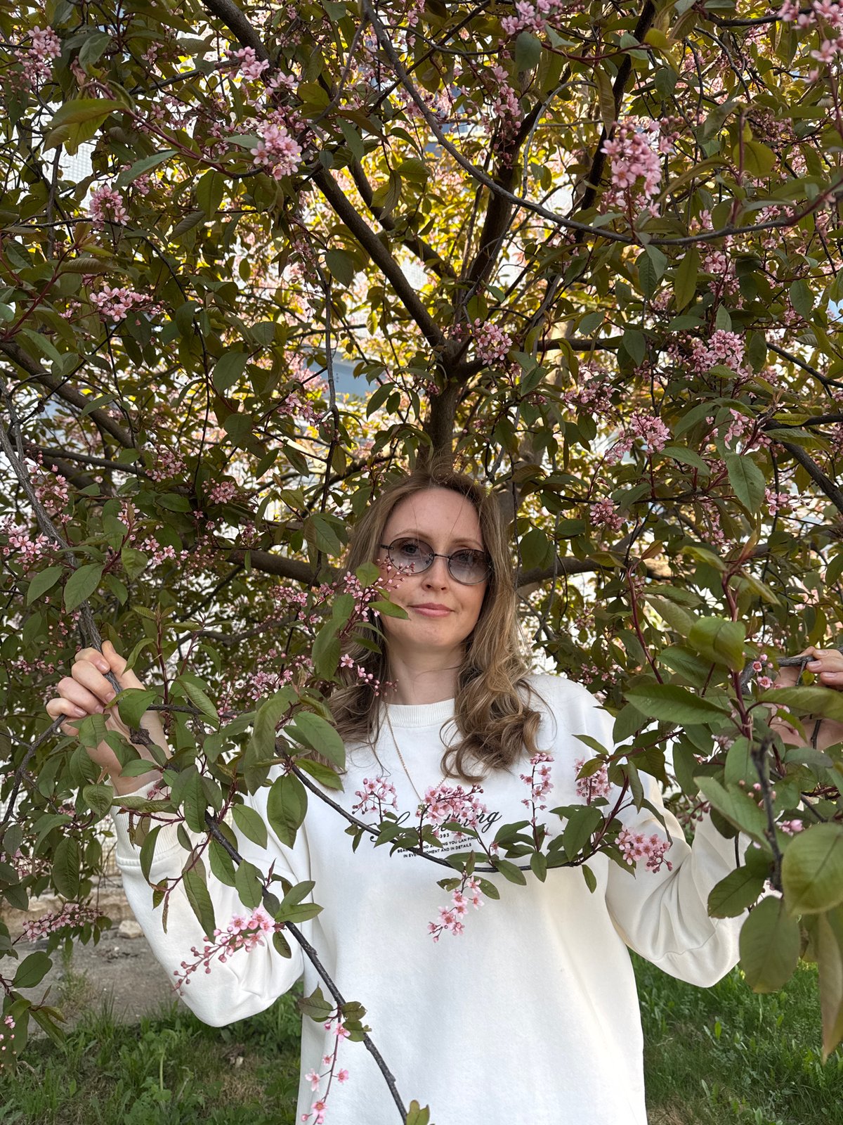 Spring family outing captured in Chaikovsky amid blooming flowers