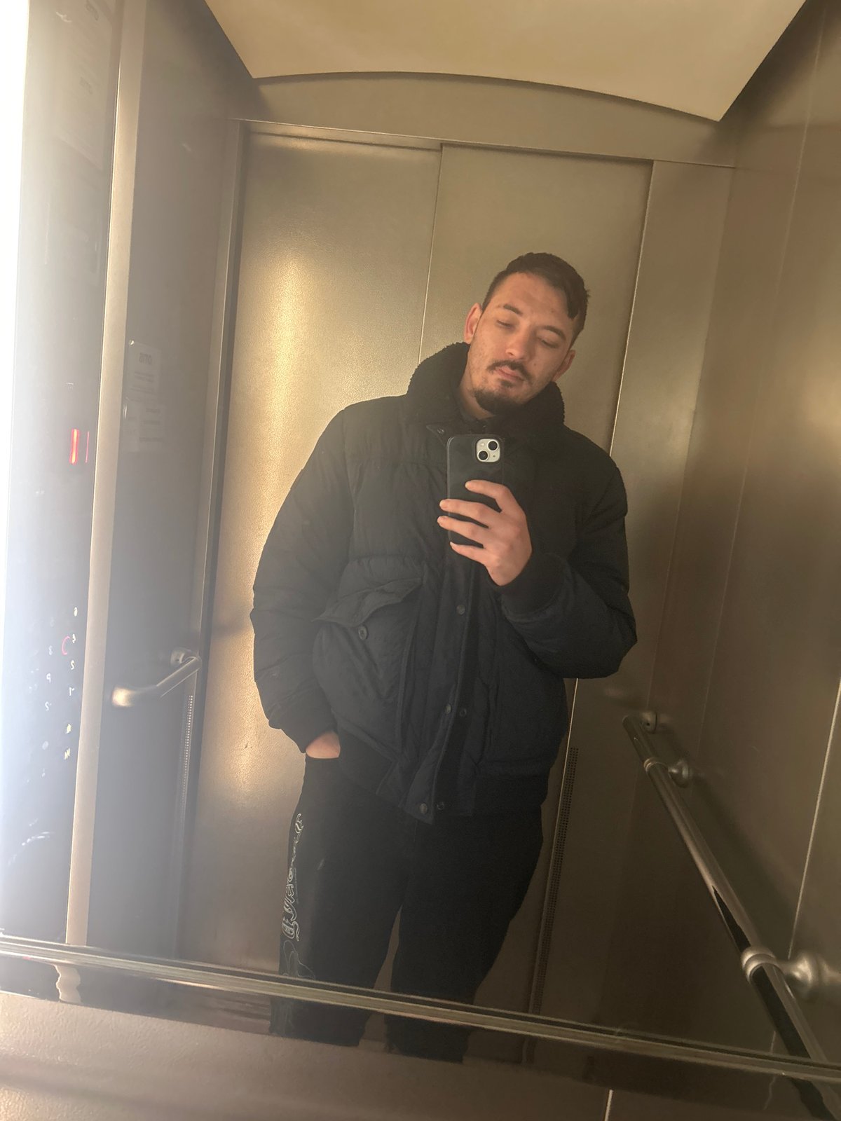 Man takes selfie in mirrored elevator in Varna