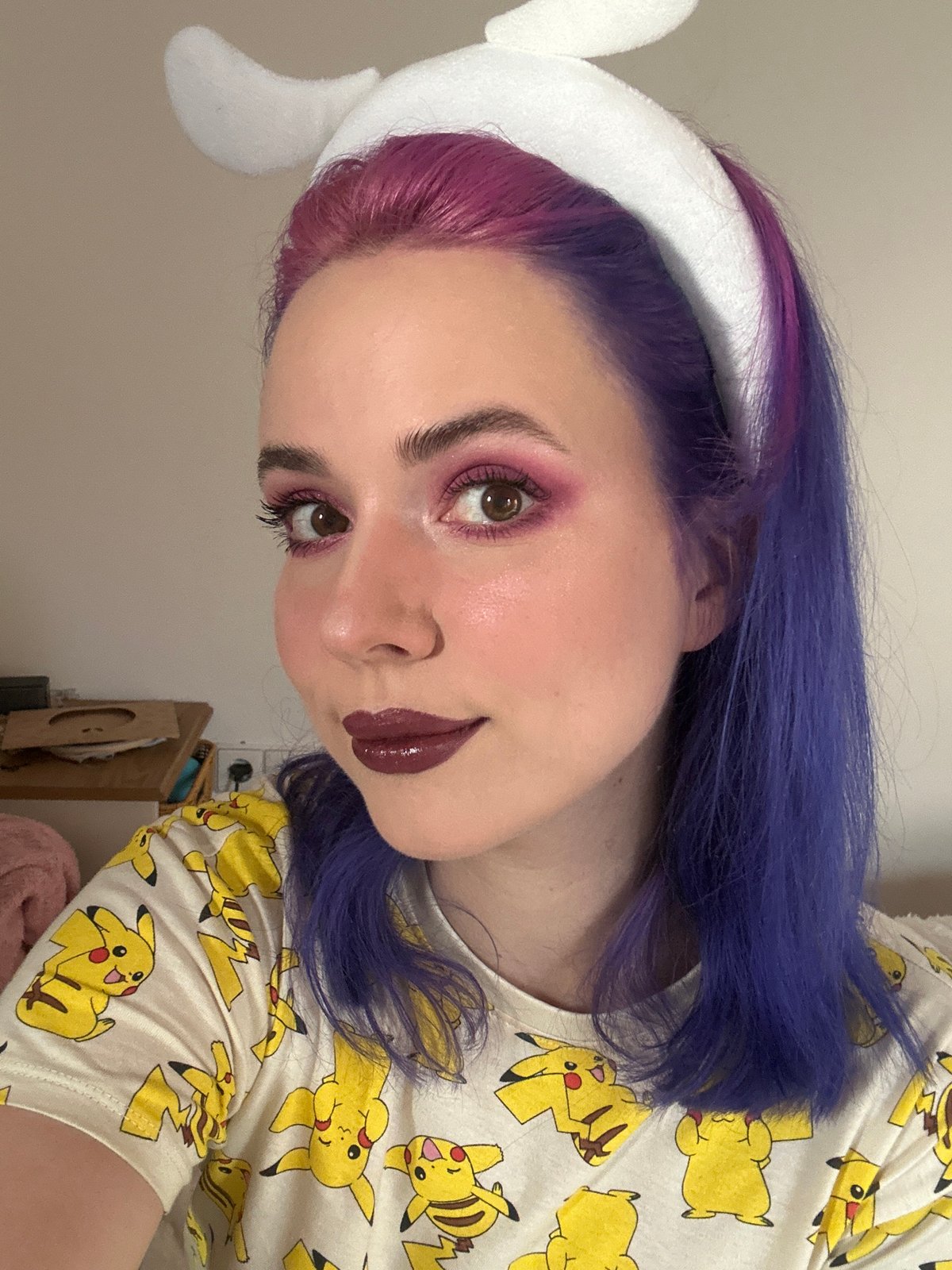 Cosplayer takes selfies in bunny ears, seeks makeup advice
