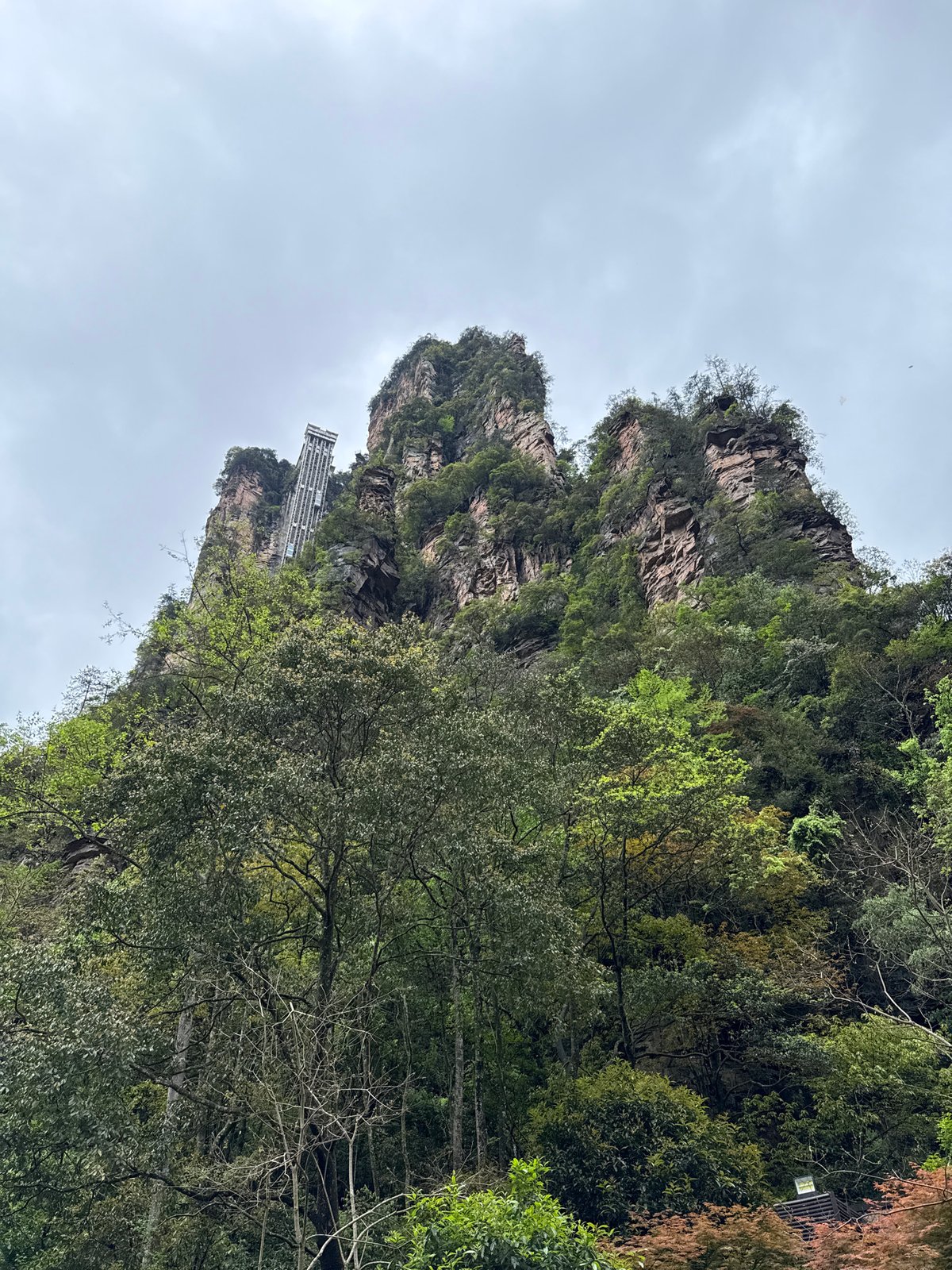 Early morning tourism activity at Luoguta's scenic rock formations