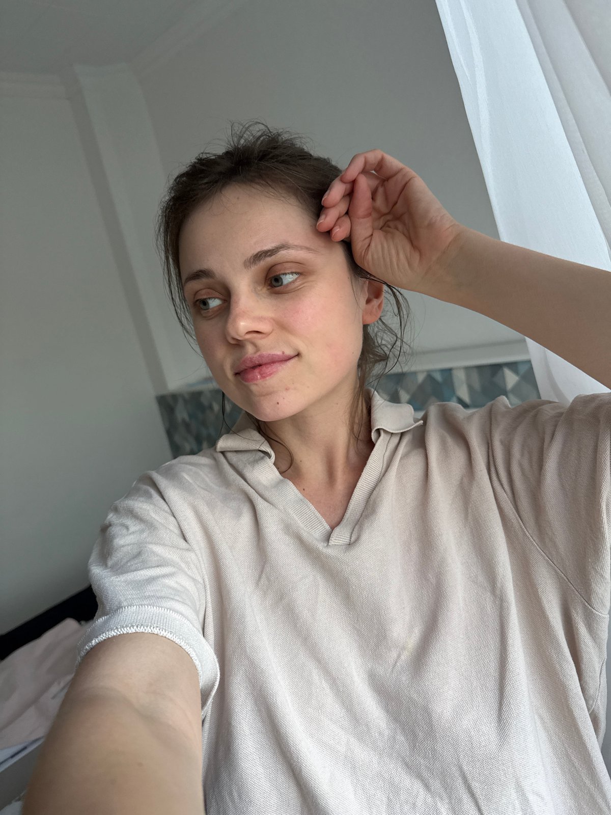 Woman documented in casual bedroom moments in Kőröshegy, Hungary