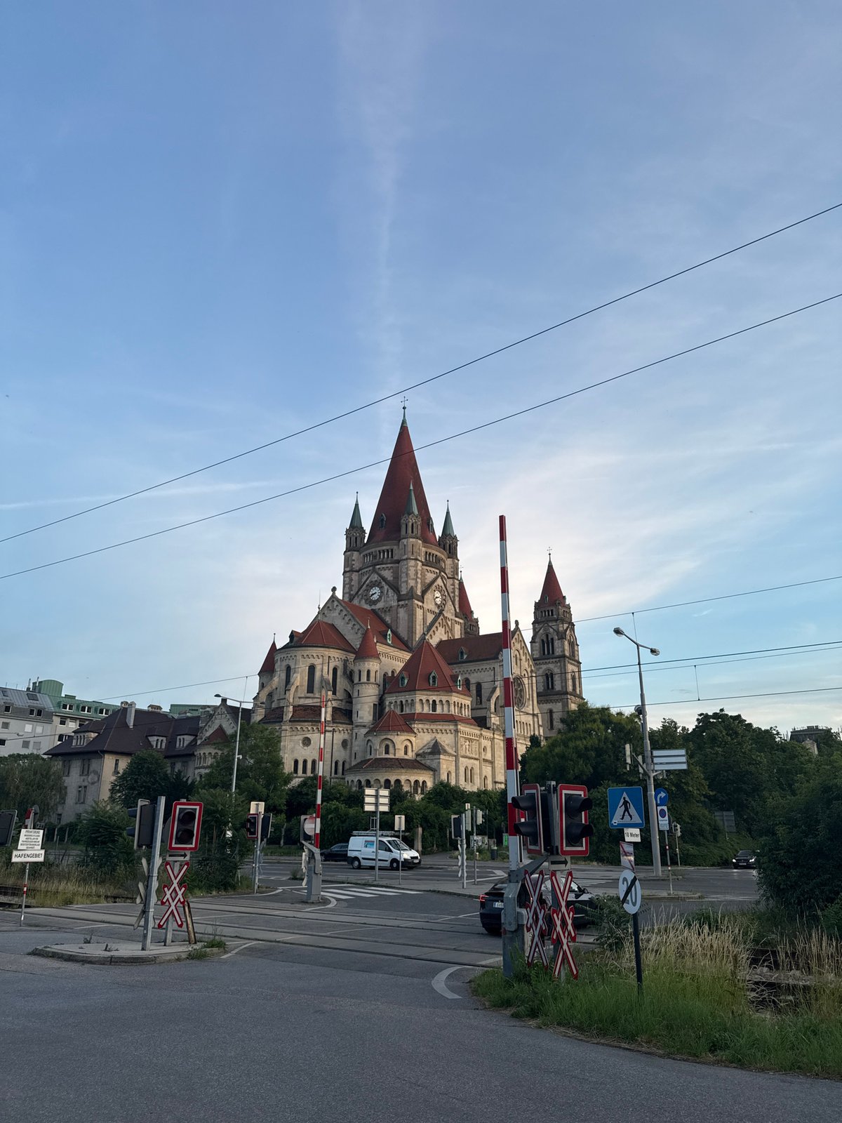 Vienna walking tour captures churches, Danube waterfront in evening