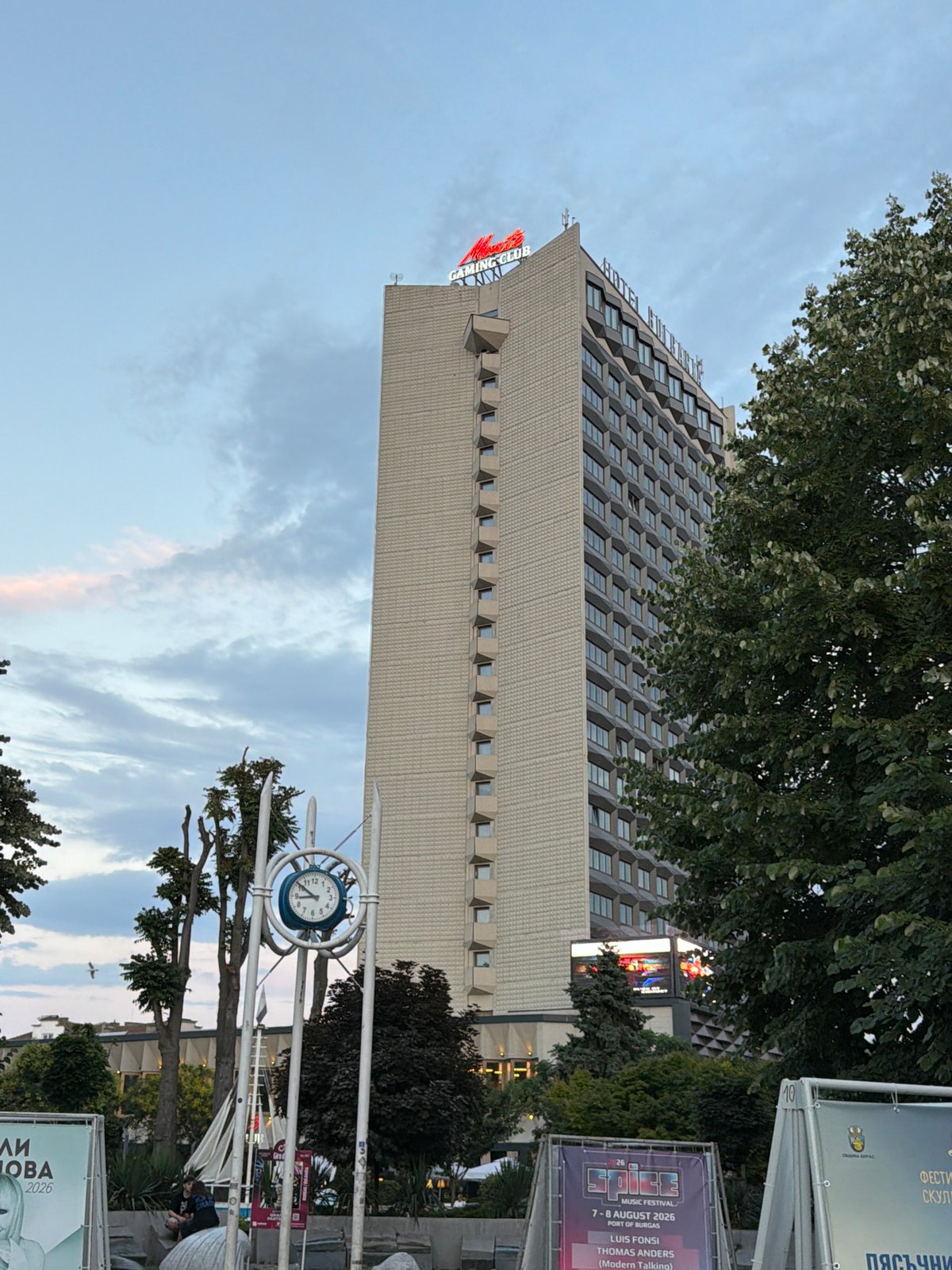 Hotel Burgas and pennant-lined streets on a cloudy evening