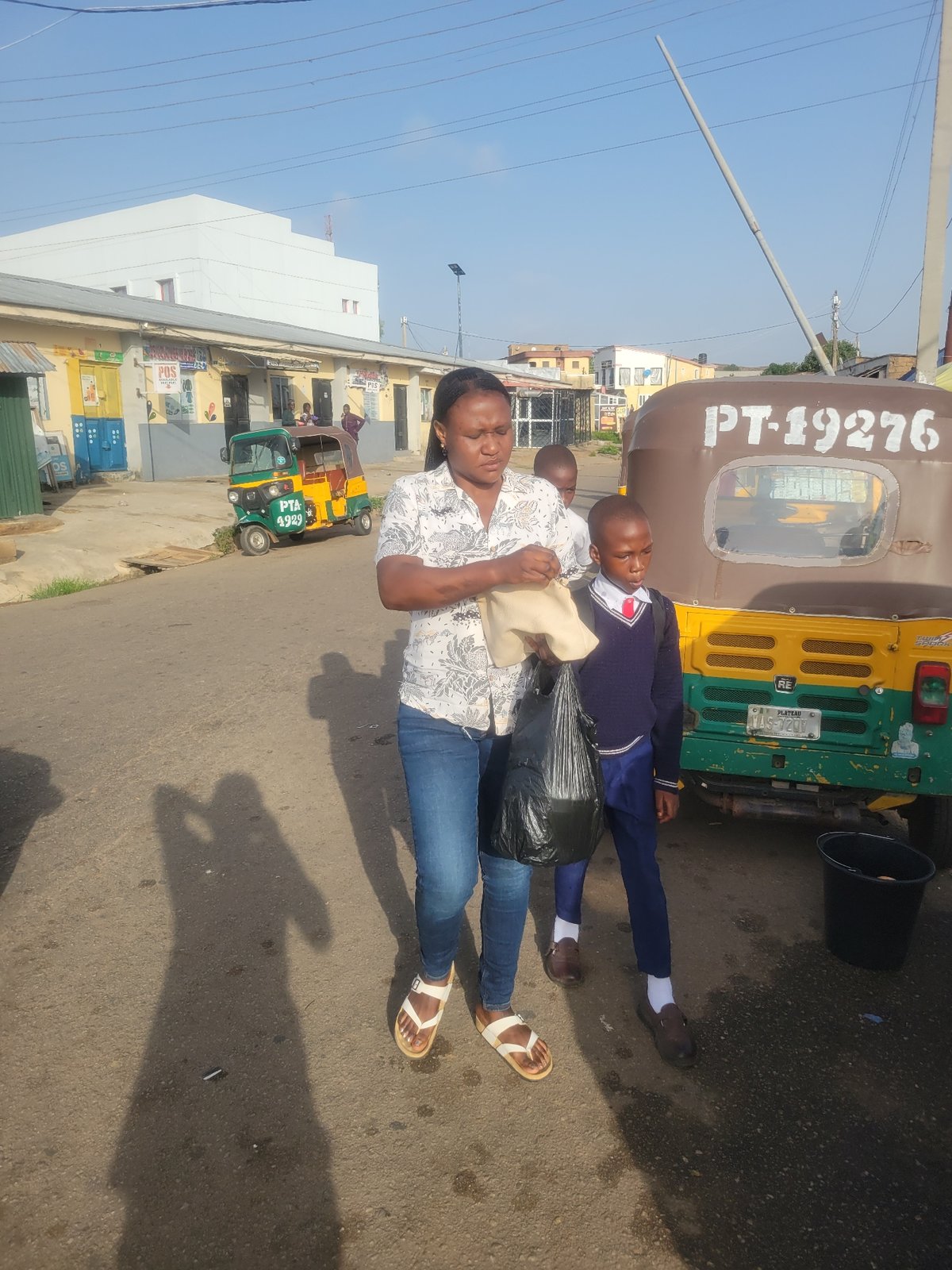 Morning street life documented across Jos, Nigeria neighborhoods