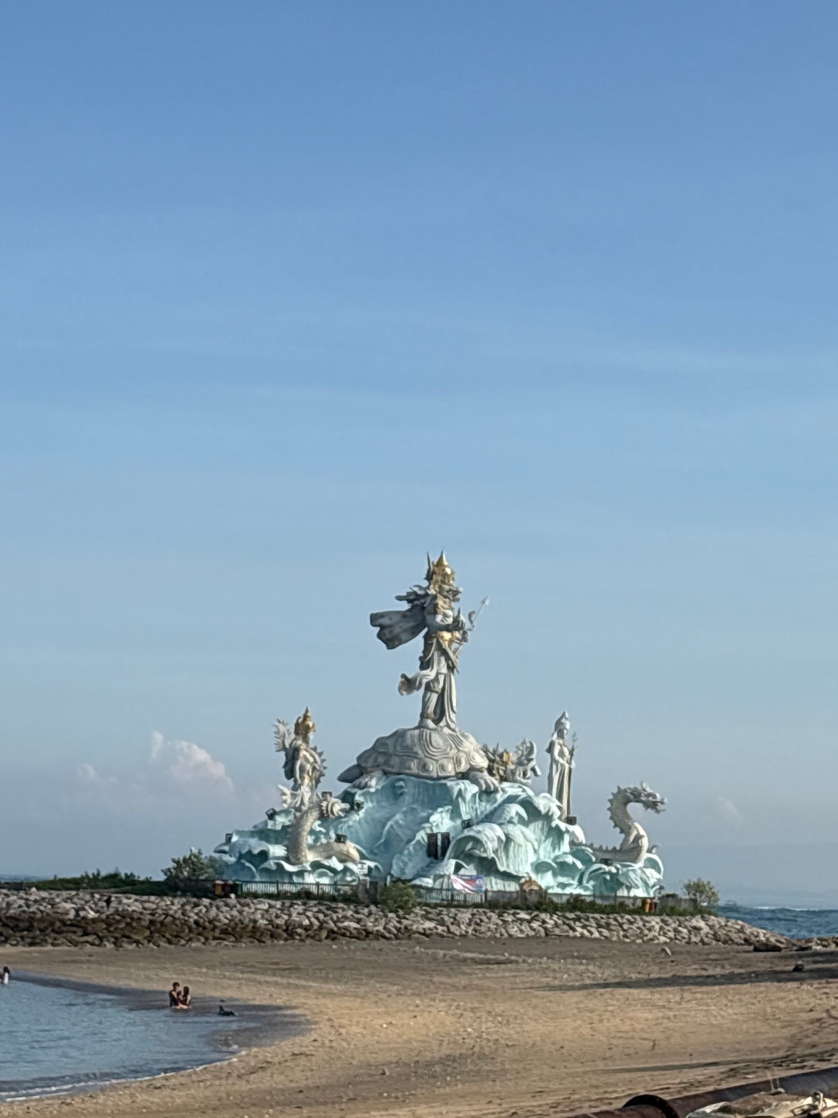 Tourist photographed at Bali beach conservation site