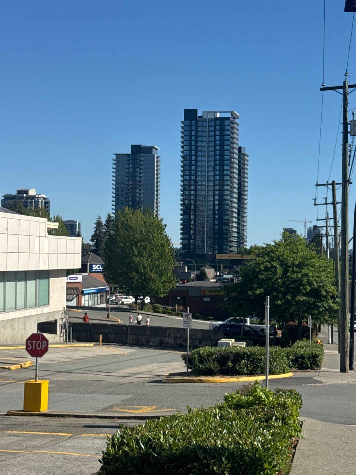 Burnaby's Lougheed corridor on a clear afternoon, SkyTrain above traffic