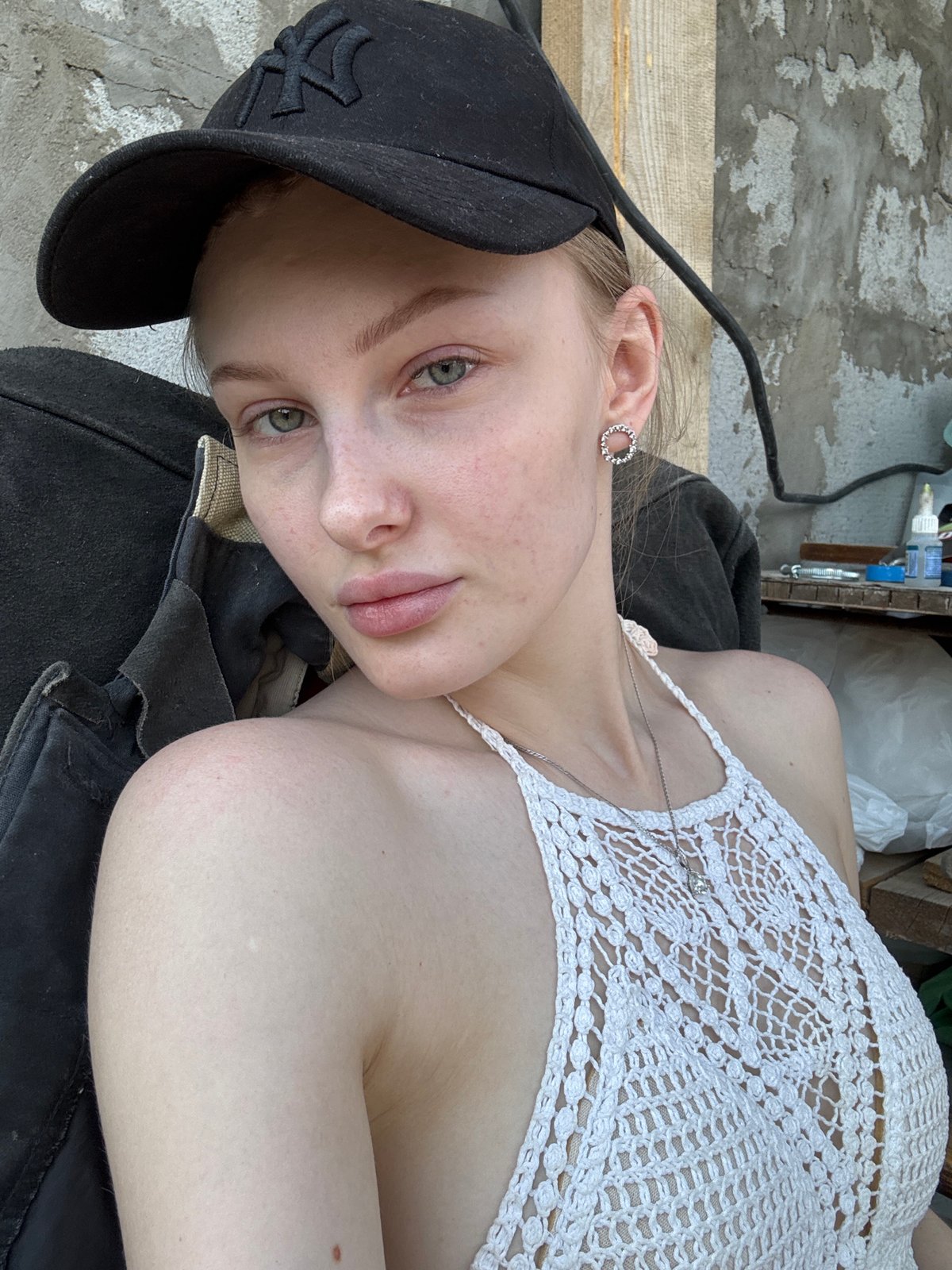 Woman in NY cap photographed in Perm, Russia