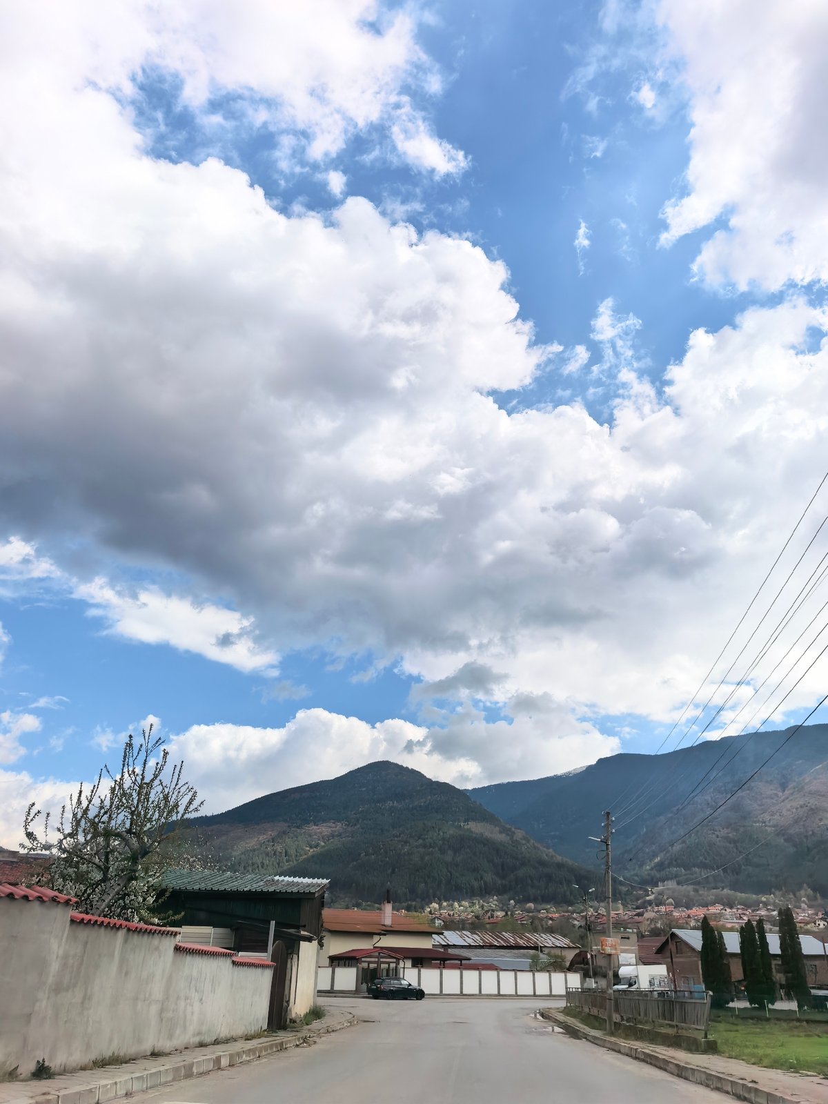 Urban street scenes with mountains captured by witness