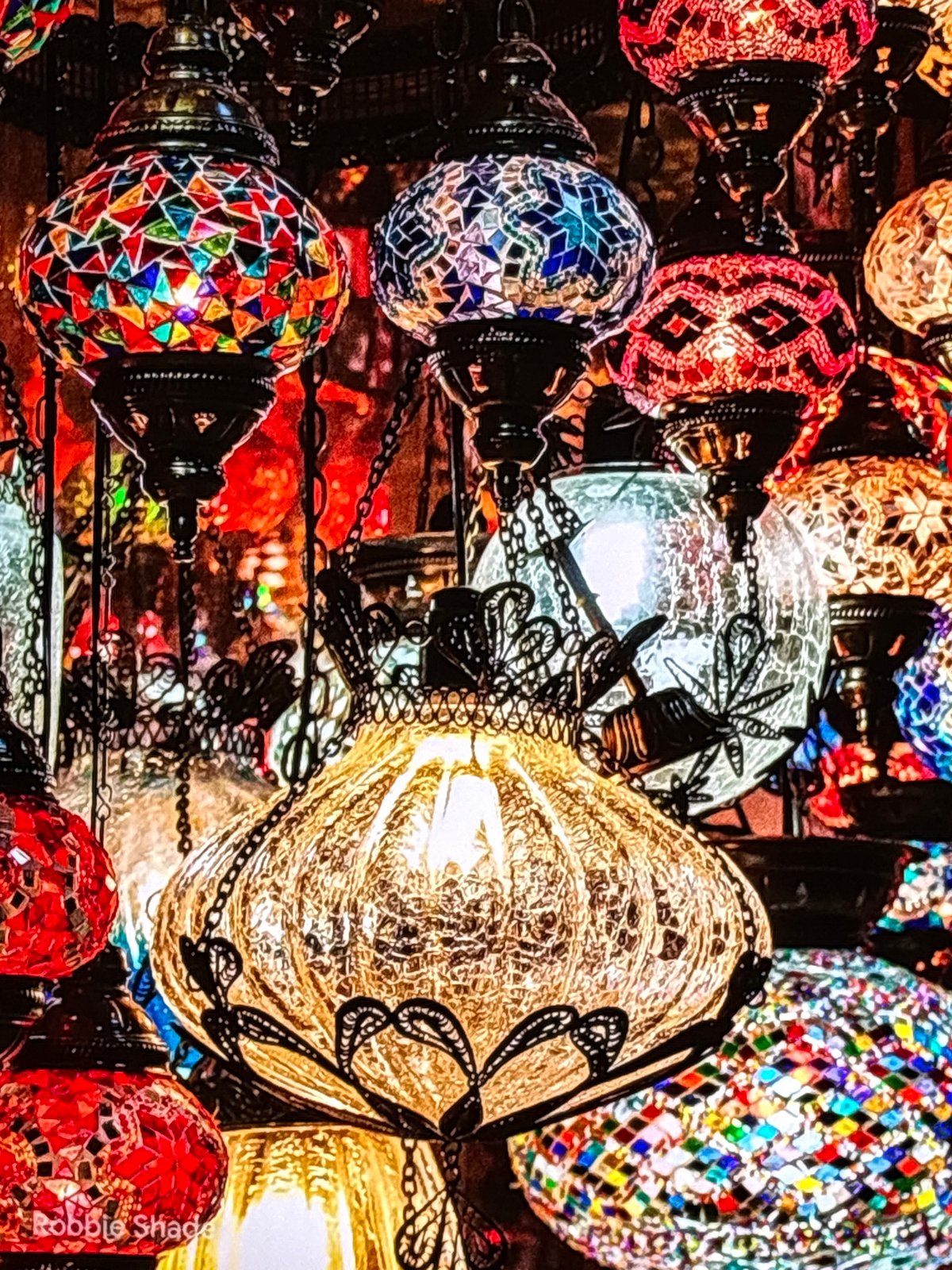 Mosaic lamps, a white cat, and chrysanthemums in Krasnokamsk