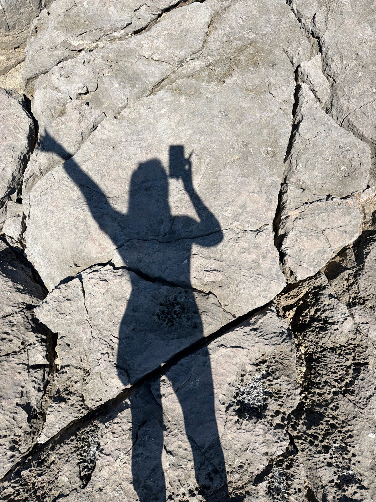 Woman photographed at Montenegro coastal location in Radovići
