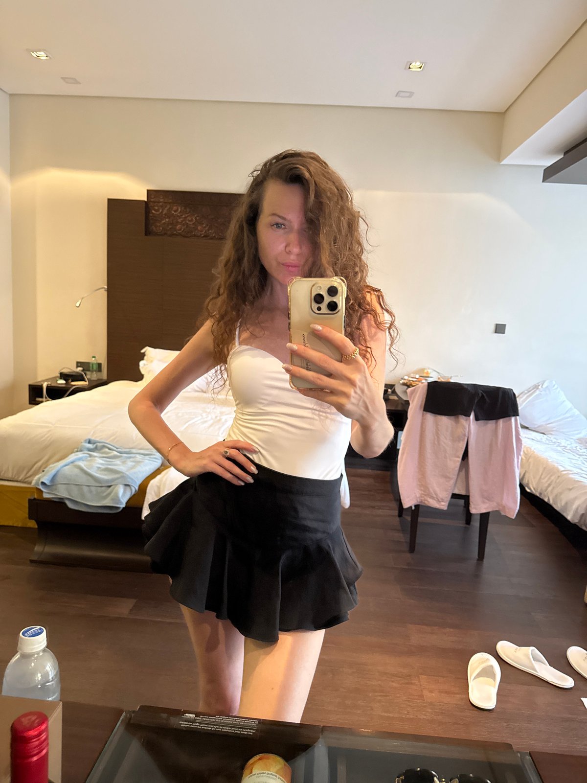 Woman documents Dubai poolside vacation with selfies and swimming