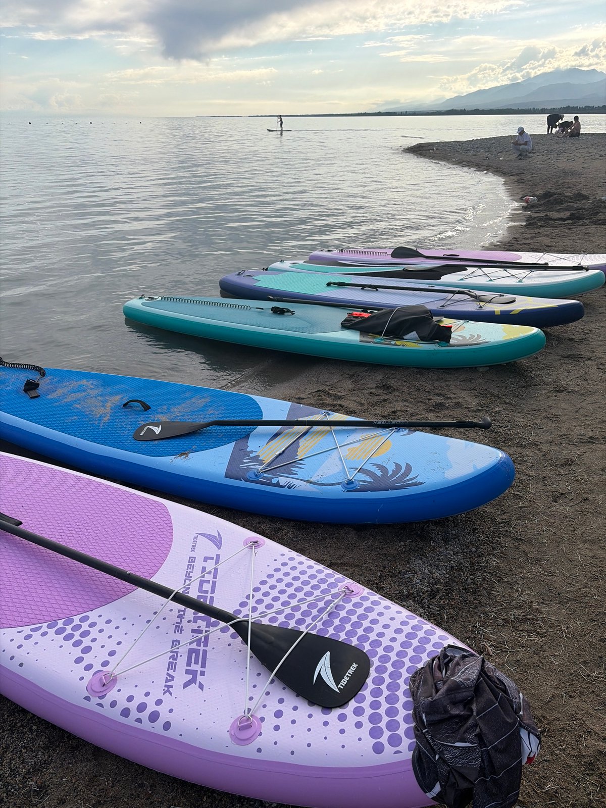 Paddleboarding, beach games, and rural mountain life