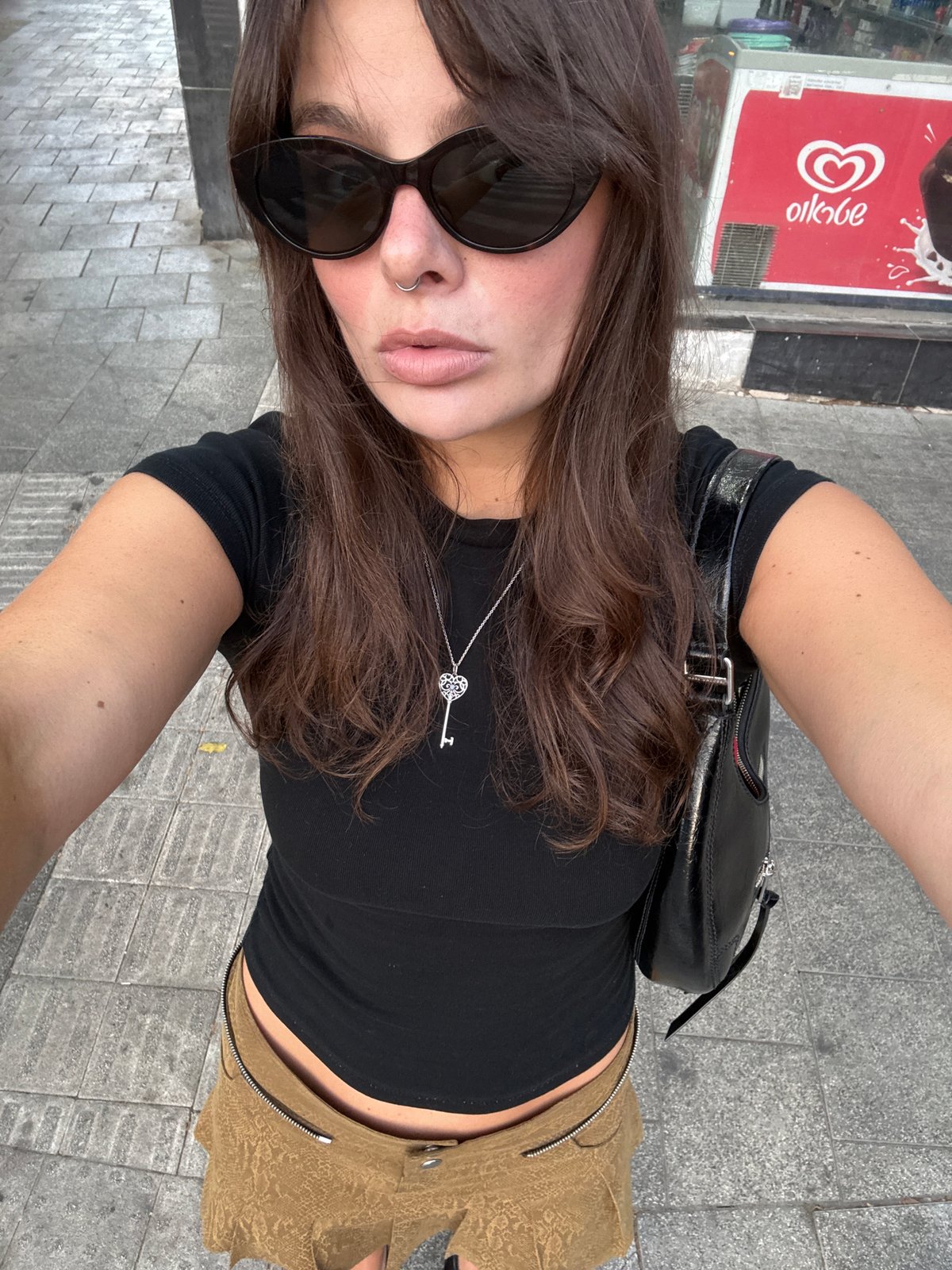 Outfit snapshots across a few Tel Aviv spots, same afternoon