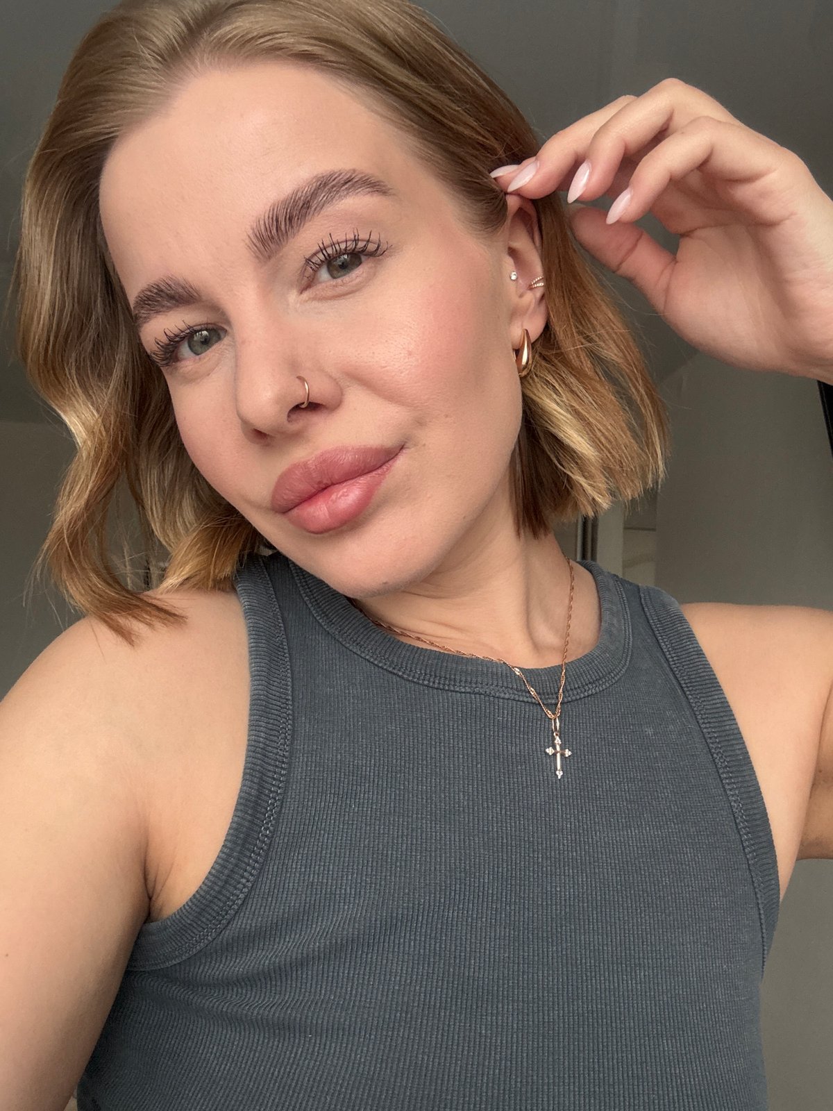 Woman takes morning selfies in Chaikovsky, Russia apartment