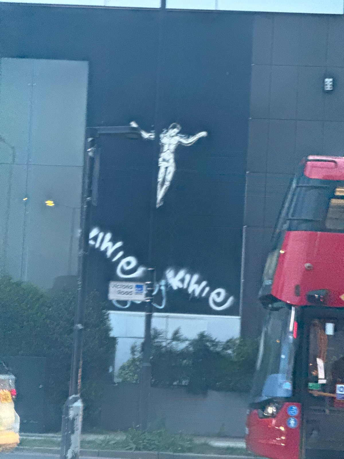 Street art featuring reclining figure documented in London