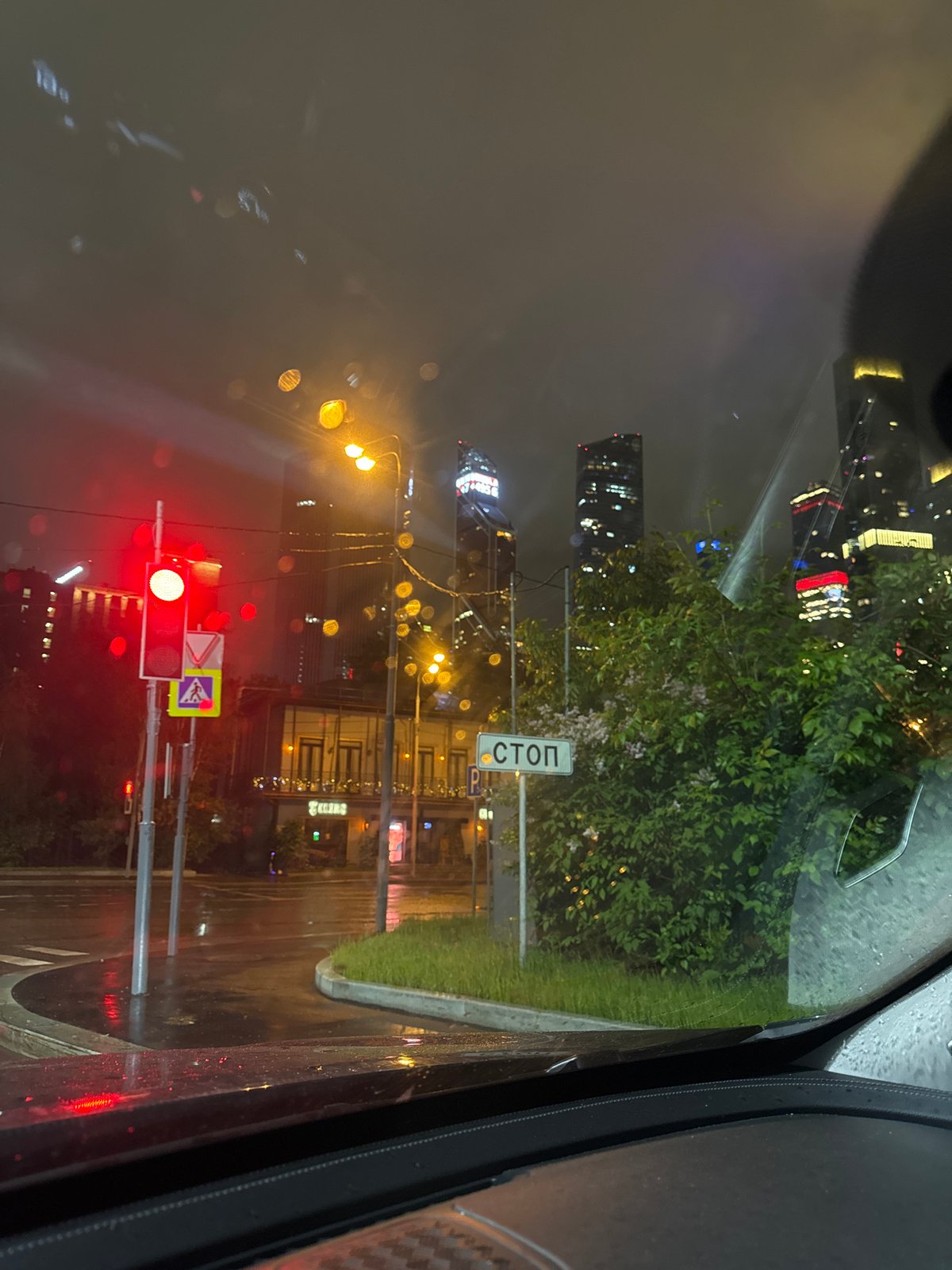 Rainy night drive through urban area captured by witness