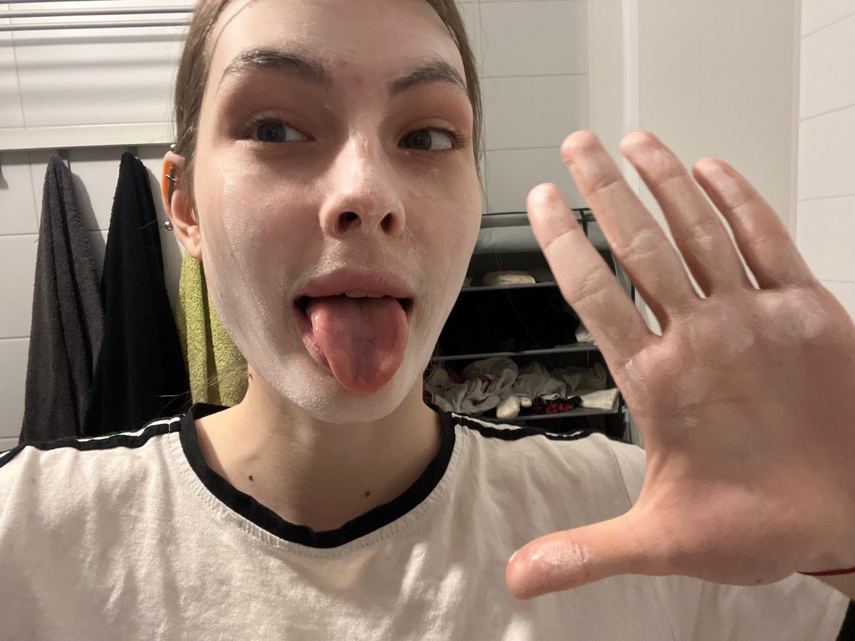 Young woman documents morning skincare routine in Saint Petersburg selfies