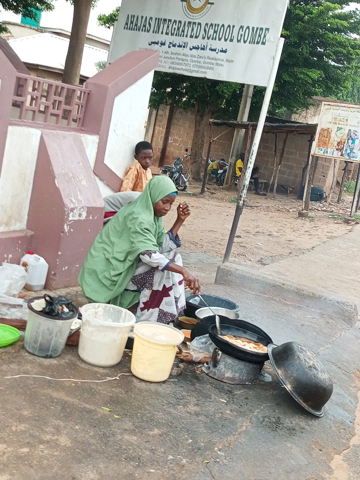 Morning street life in Pantame, Nigeria — people, traffic, routines