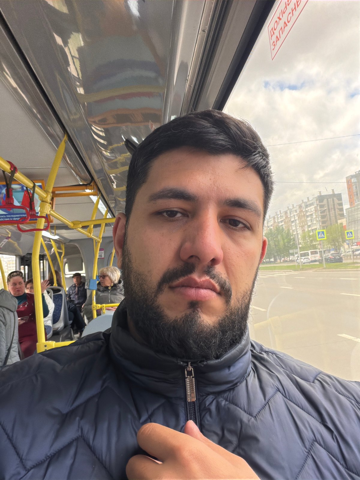 Man in blue jacket observed on Krasnoyarsk public transport